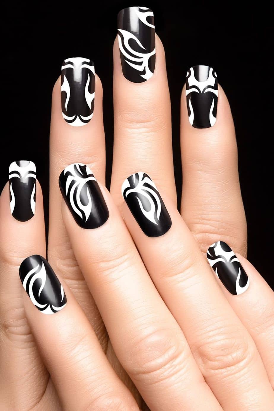 Shiny Black Nails with White Aztec Pattern